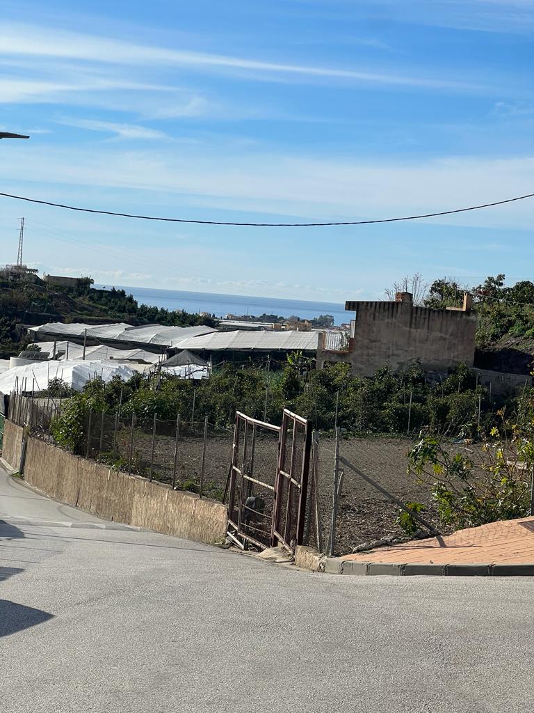 Grundstück in Algarrobo, Meerblick